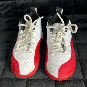 Kids red and white Jordan’s 10C
